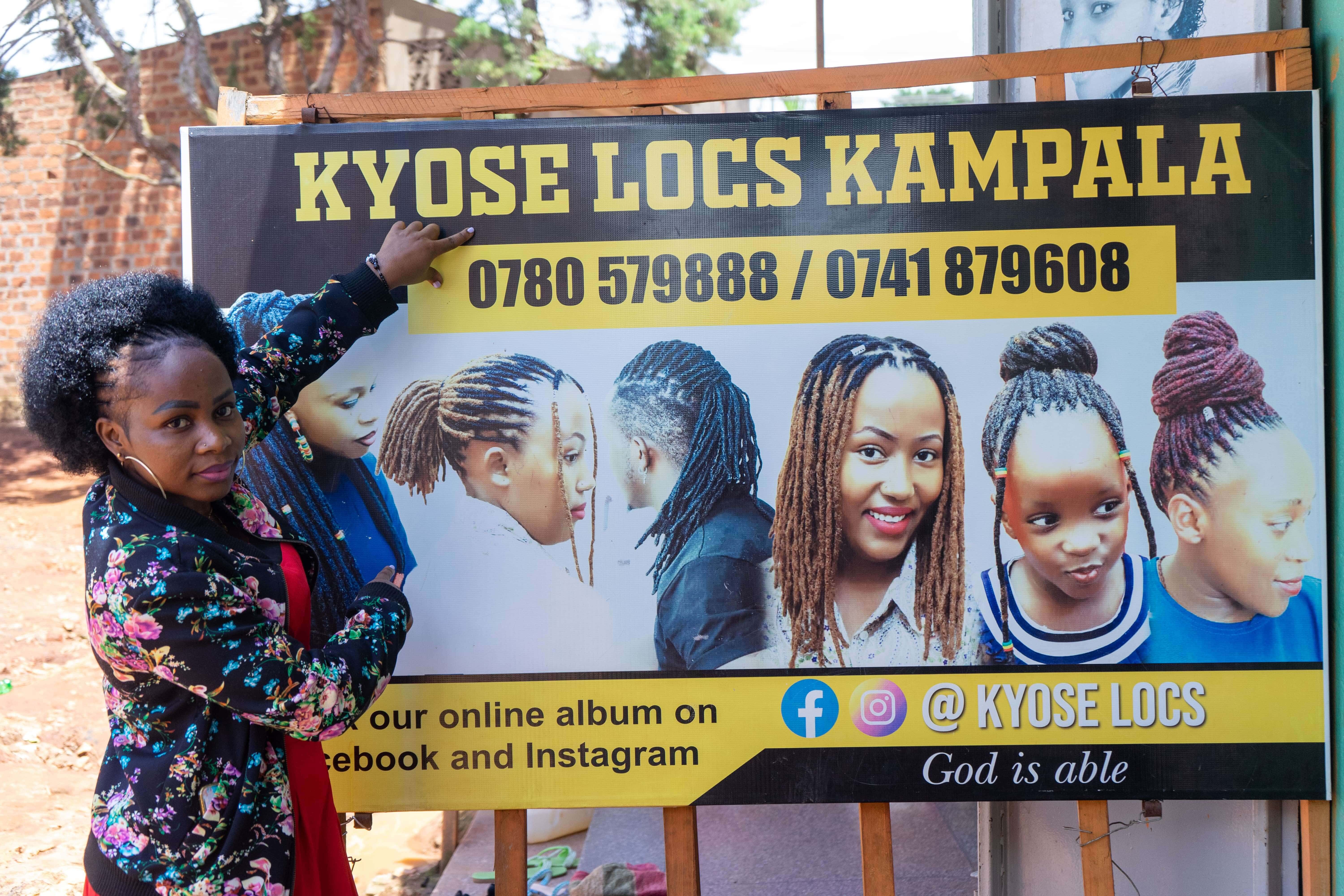 Florence Kavugho displays social media handles for her salon business. Photo: Nathan Ijjo Tibaku/TheIRC